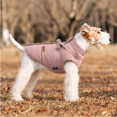 Smoky Pink warm dog puffer vest with built-in harness on white terrier