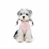 Preppy turtleneck dog dress in pink with pleated plaid skirt on dog model